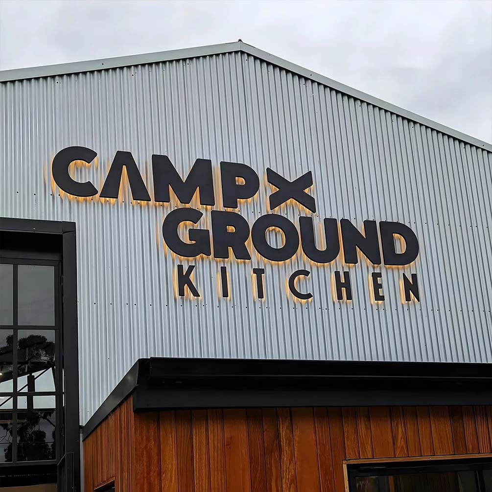 outdoor business signage installed on commercial building exterior