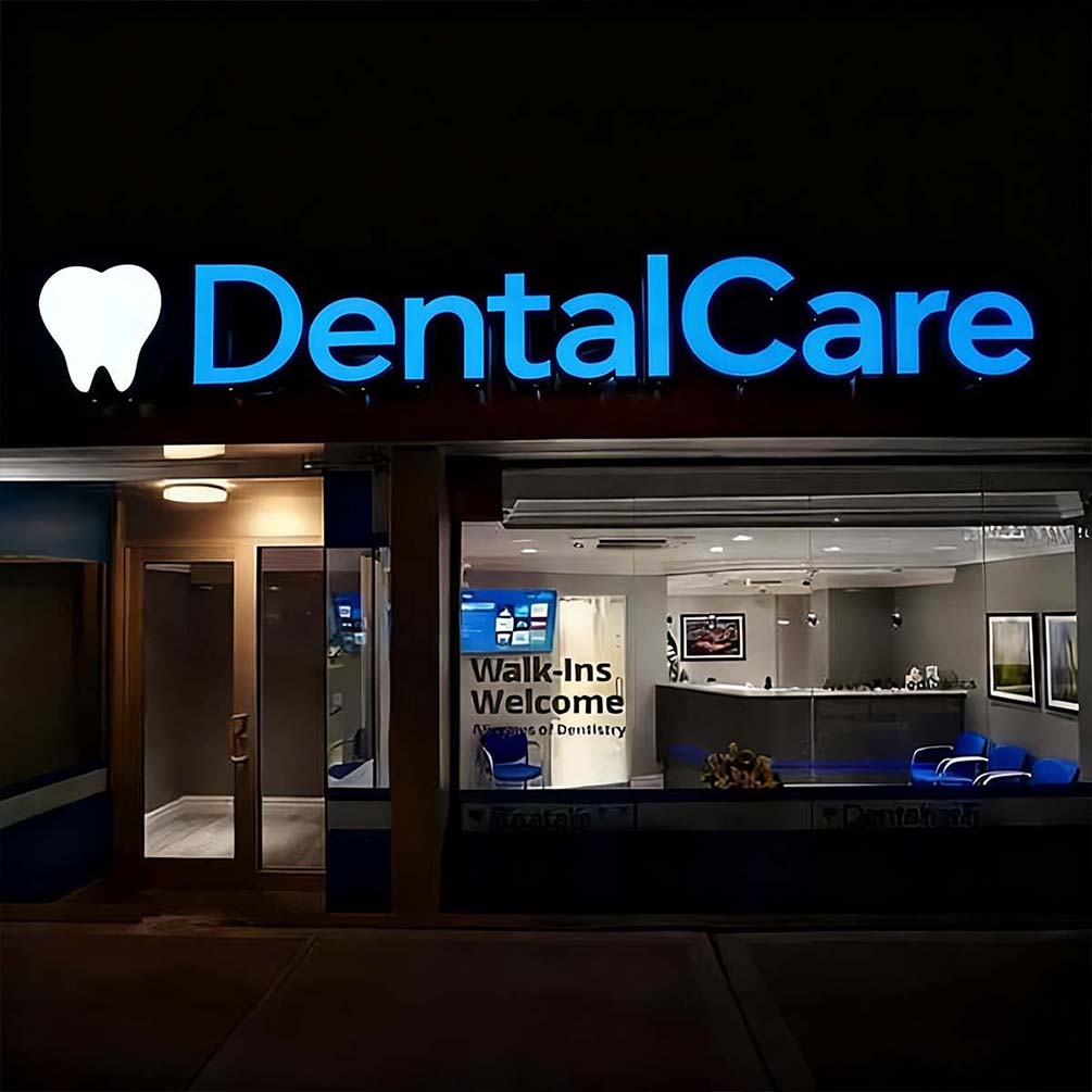 illuminated storefront signs visible at night