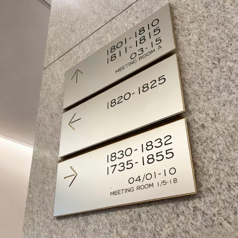 wayfinding identification signs labeling rooms and departments in modern office building