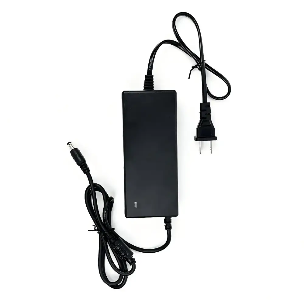 Slim black 12V power adapter with two-prong plug and DC connector