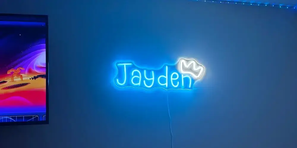 Blue Jayden custom LED neon name sign with white crown