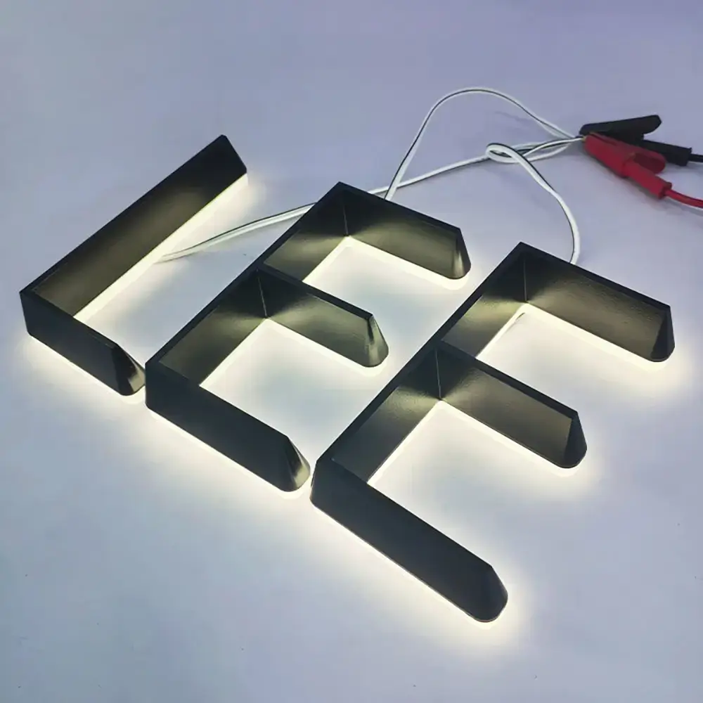 Black 3D embossed acrylic letters with white rear illumination