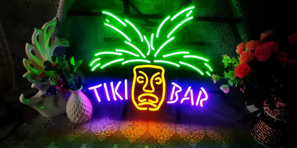 Colorful Tiki Bar glass neon sign with palm leaves and a tiki mask