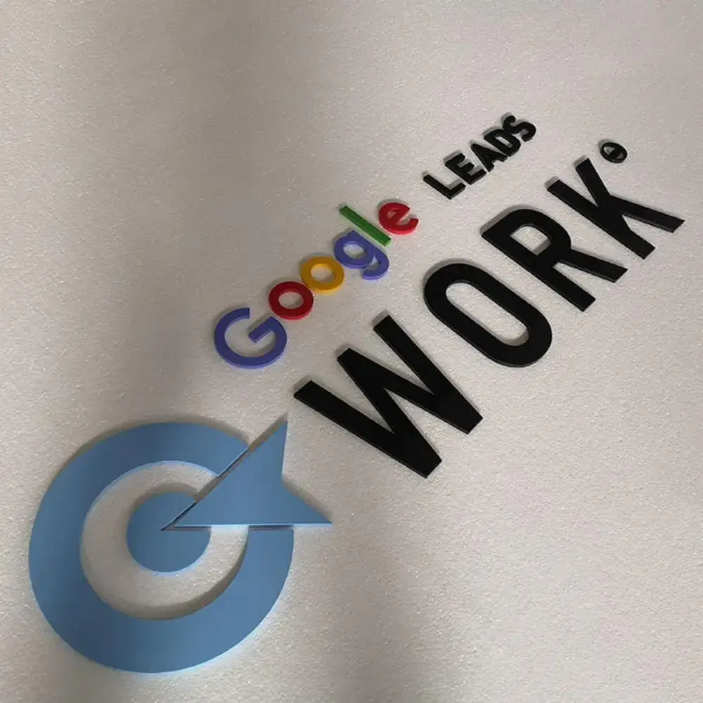 Google Leads Work dimensional sign with colorful Google logo and blue arrow icon