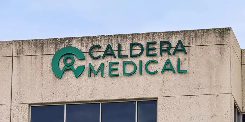 Caldera Medical green dimensional letters and logo on building exterior