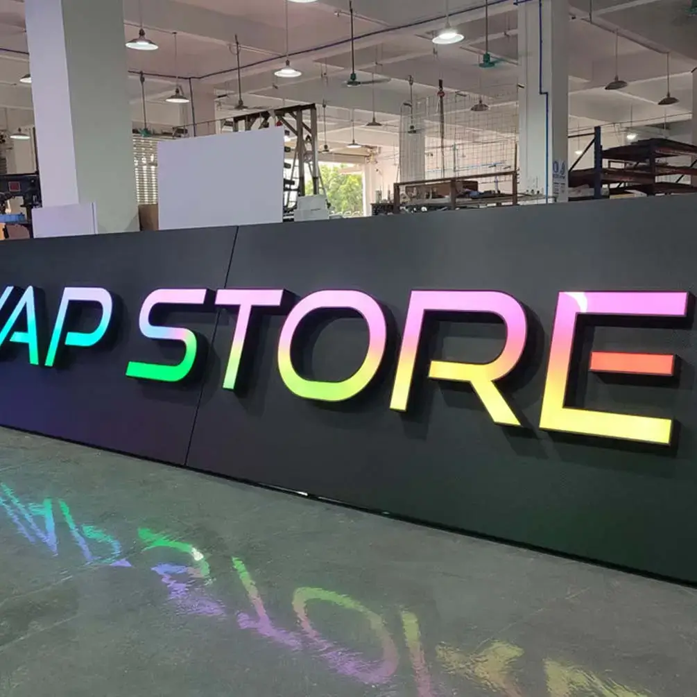 Gradient illuminated letters mounted on a dark backer panel