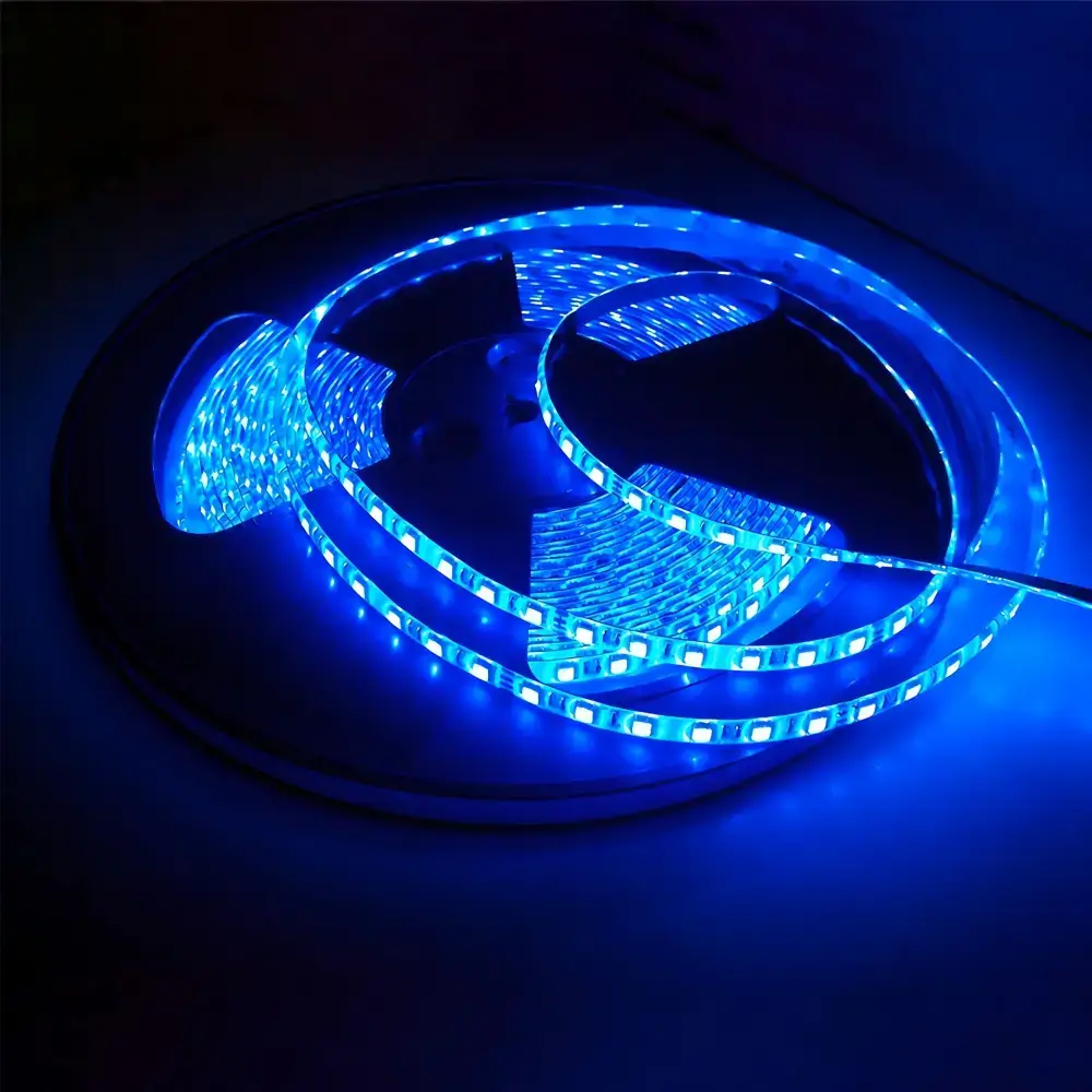 Blue LED strip illuminated on a coiled reel