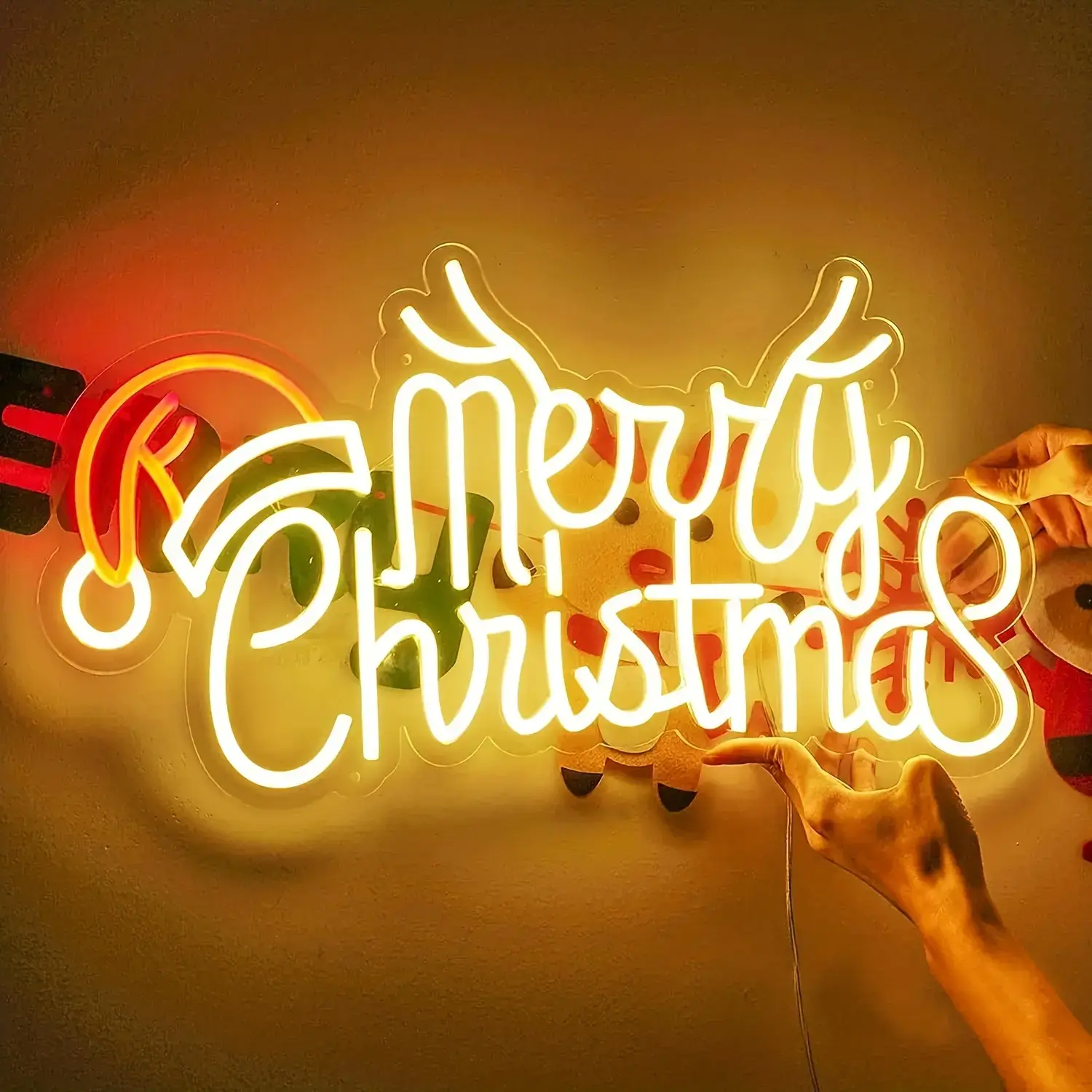 Warm white Merry Christmas neon sign with reindeer antlers