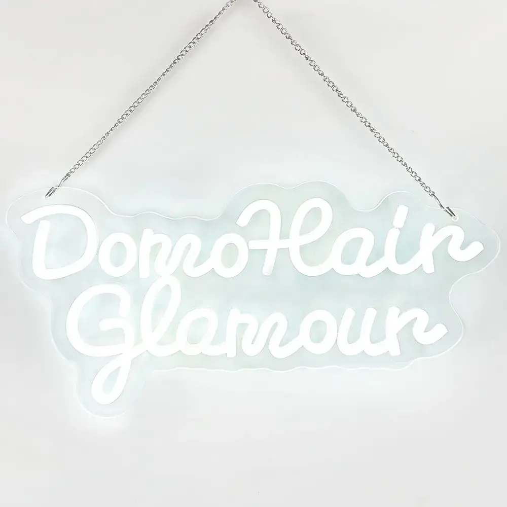 White script LED neon sign on a cut-to-shape clear acrylic backboard