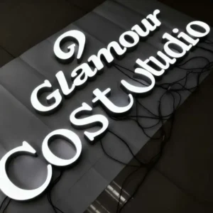 Illuminated channel letters prepared for direct or flush mounting with wiring visible