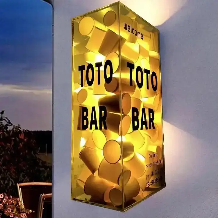 Transparent decorative light box mounted directly to an exterior wall