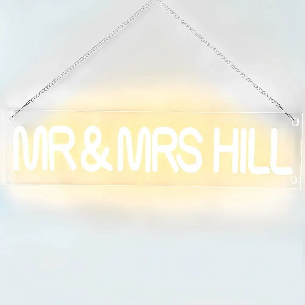 Warm white LED neon lettering on a rectangular clear acrylic backboard