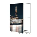 Freestanding SEG fabric light box shown beside its aluminum frame and support feet