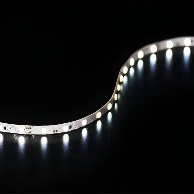 Flexible single-color LED strip glowing white on a black background