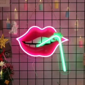 UV-printed pink lips and green straw LED neon sign hanging on a display grid