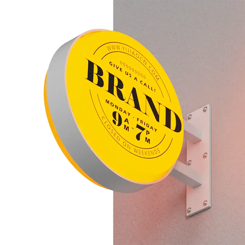Round yellow vacuum-formed projecting light box with black business graphics