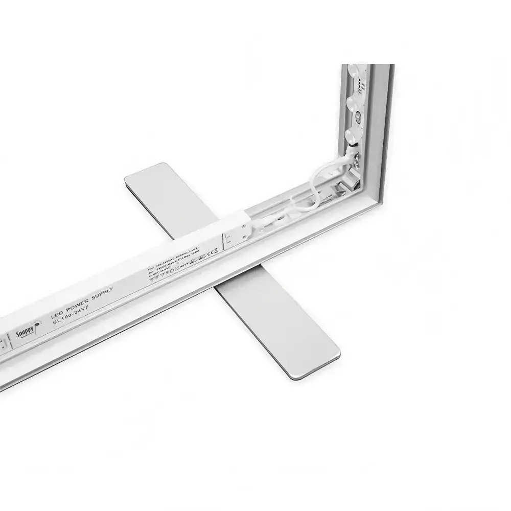 Close-up of an SEG light box frame corner with LED strips wiring and support foot